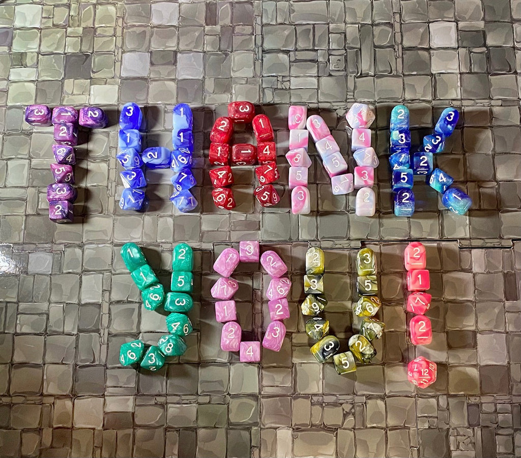 Thank you spelled out in dice