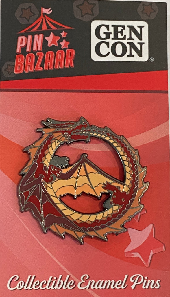 Collectible enamel pin with dragon design on Gen Con packaging